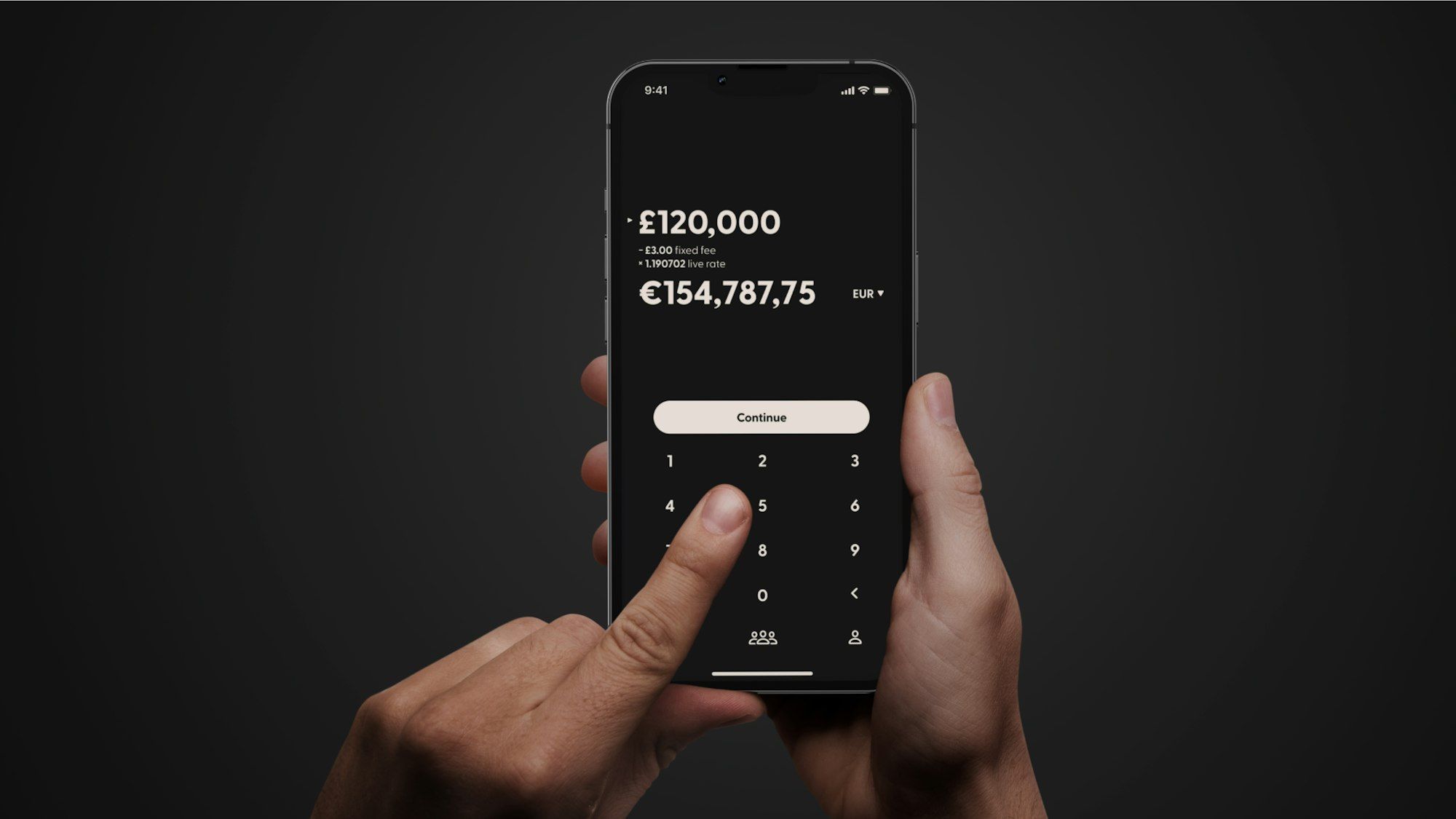 Hands holding a smartphone using a banking app to make a money transfer