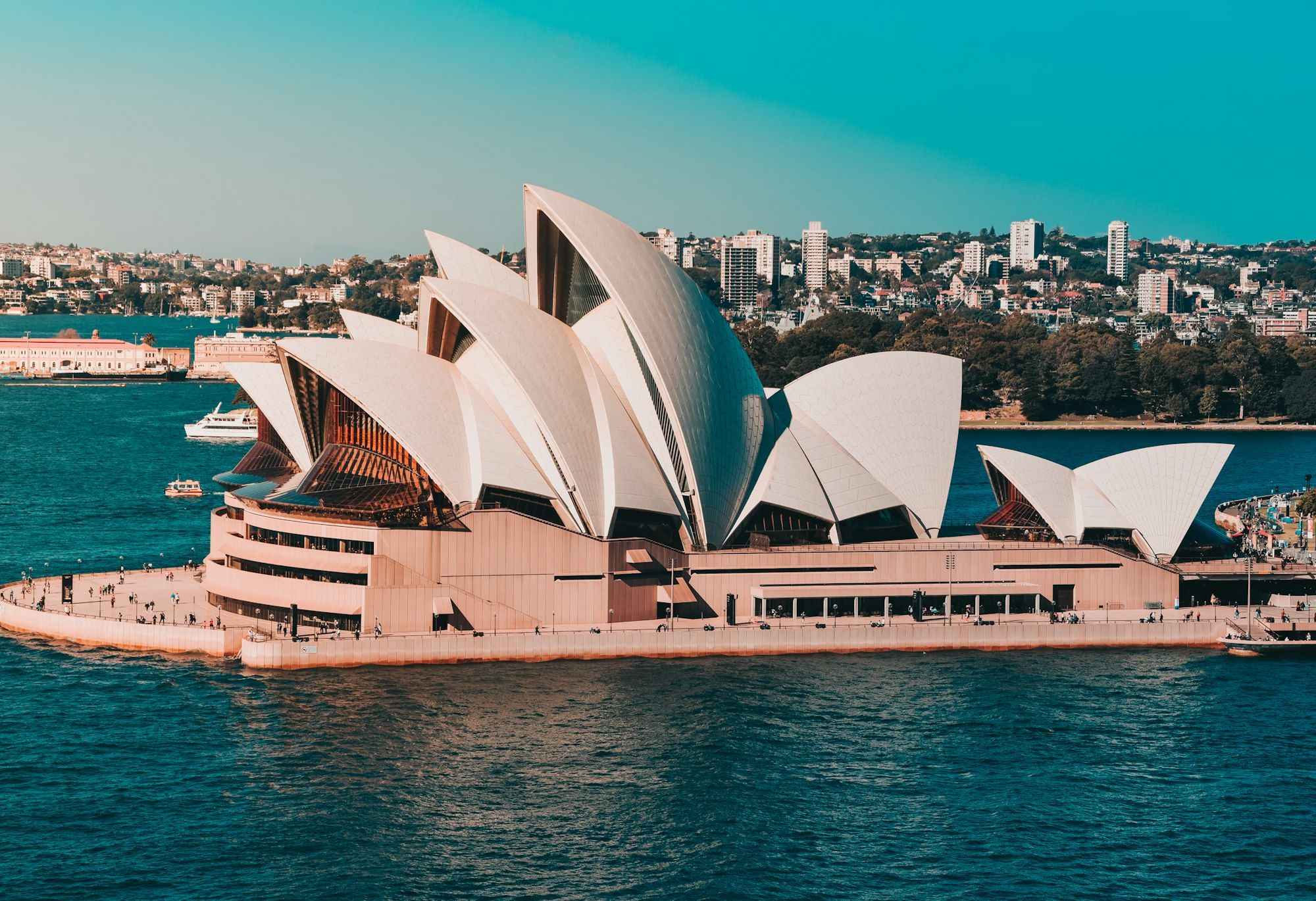 Sydney Opera House on the harbour with the city skyline on a clear day